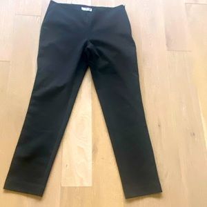 Kennar side zip strech pants size 8.  Black with small cream dots.